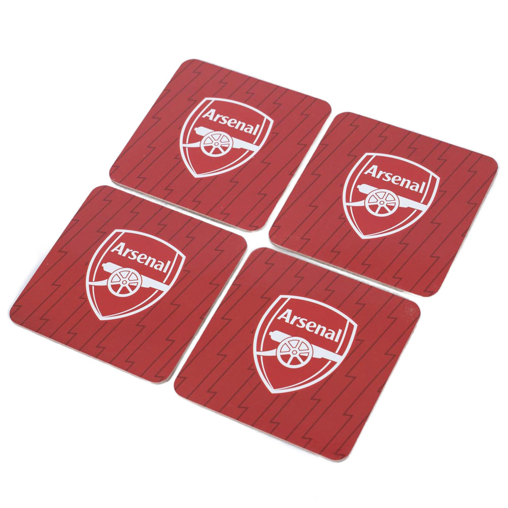 Set of four Arsenal FC red cork coasters each with a white Arsenal crest in the middle