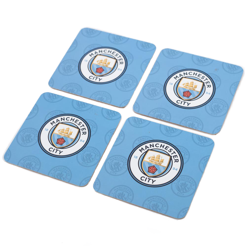 Set of four Manchester City FC sky blue cork coasters each with a full colour Man City crest