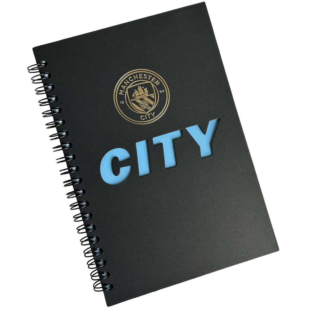 Manchester City FC A5 spiral bound hardback notebook with a silver crest and cut out City text