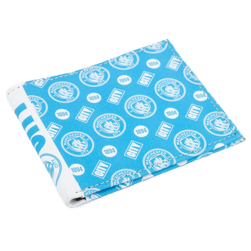 Manchester City FC vibrant brushed canvas bi-fold wallet with a Man City multi icon design