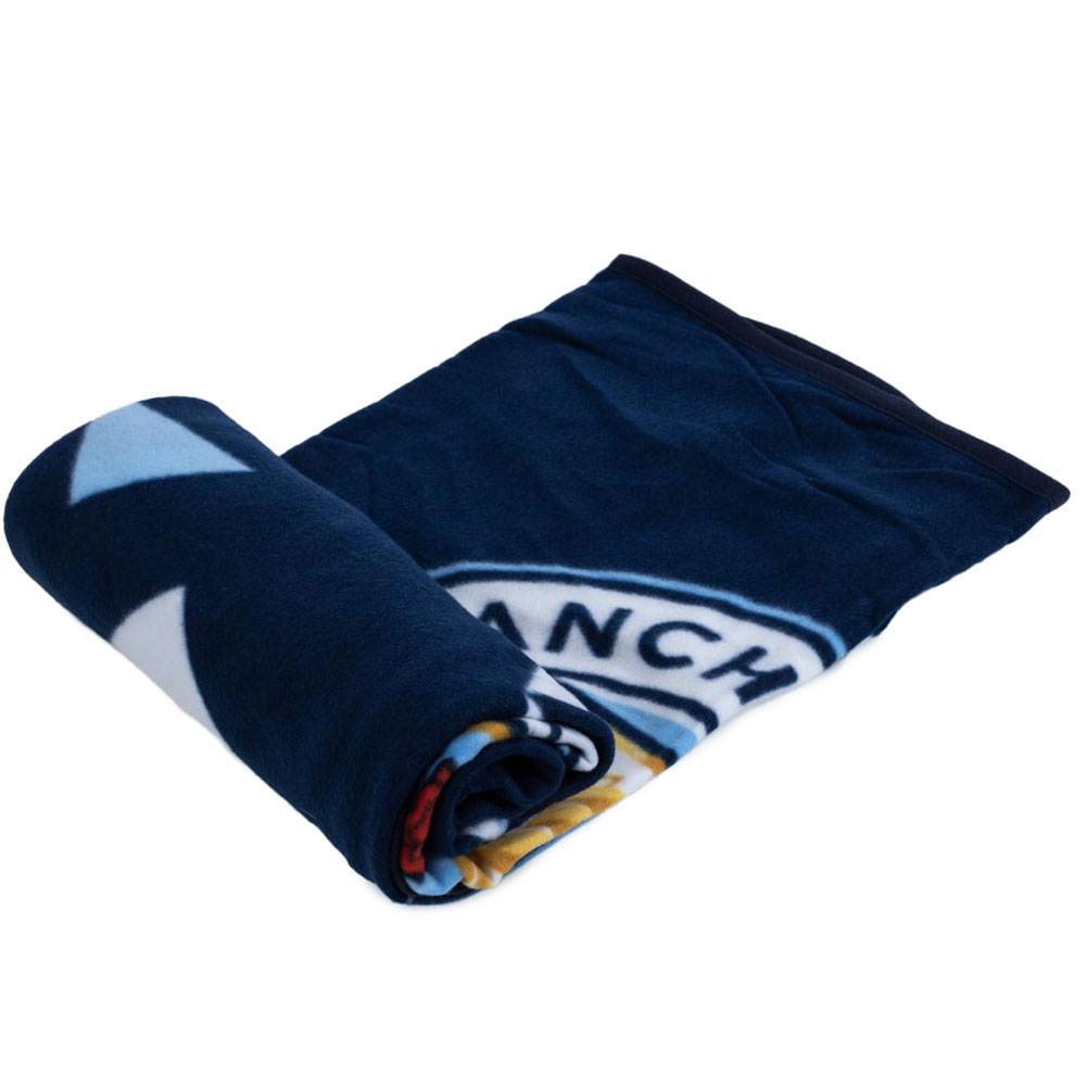 Manchester City FC navy blue particle design fleece blanket with a large full colour Man City crest