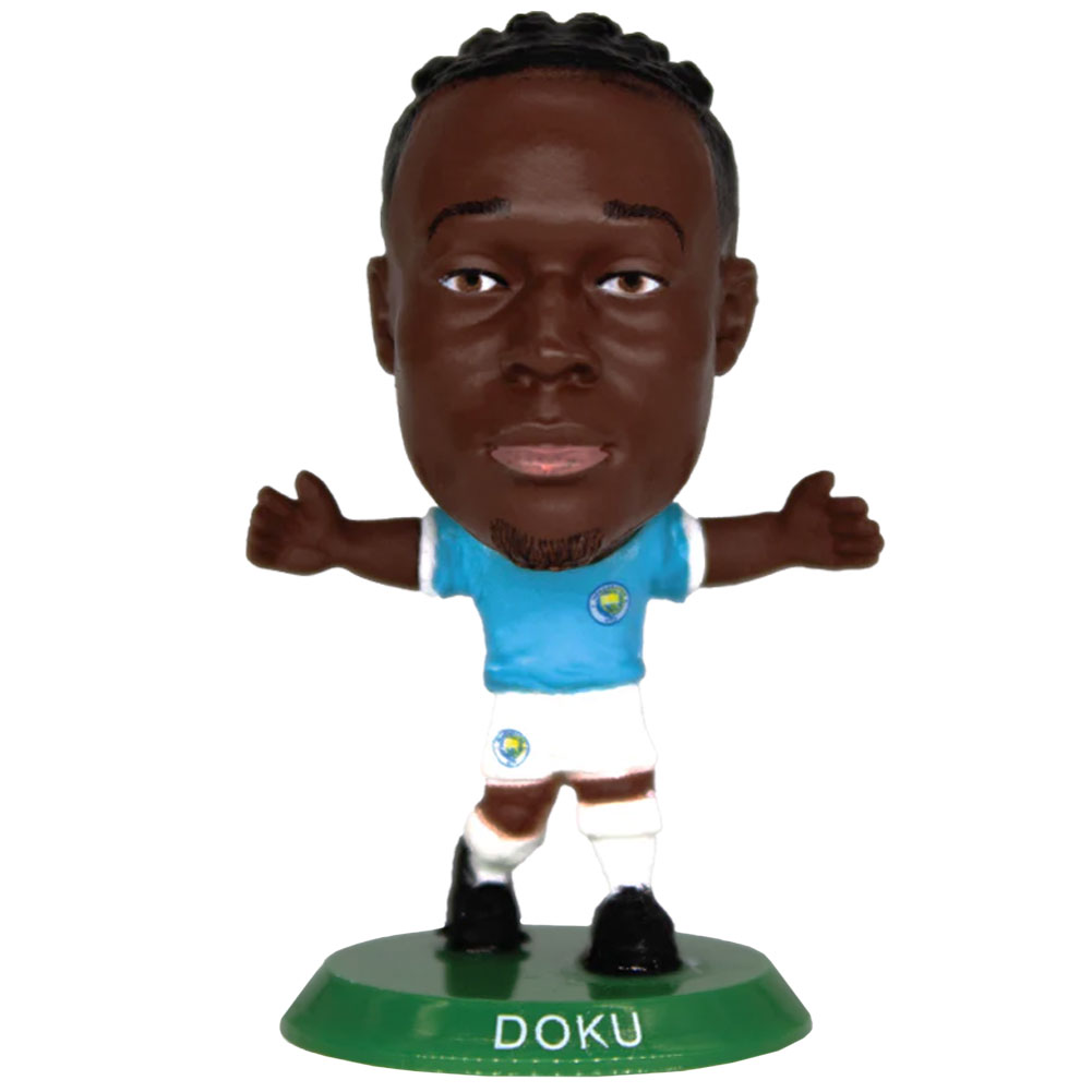 Jeremy Doku SoccerStarz figure in the classic Man City home kit on a green base