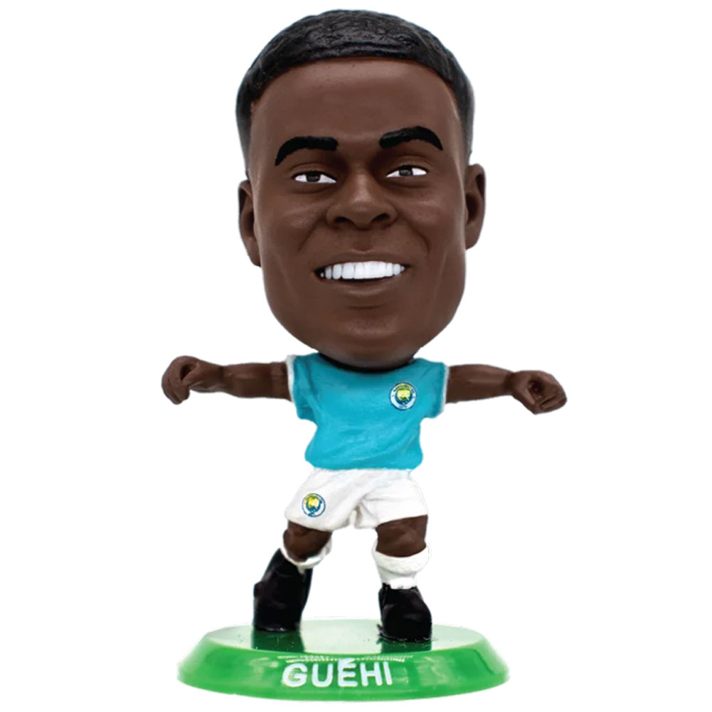 Guehi SoccerStarz figure in the classic Man City home kit on a green base