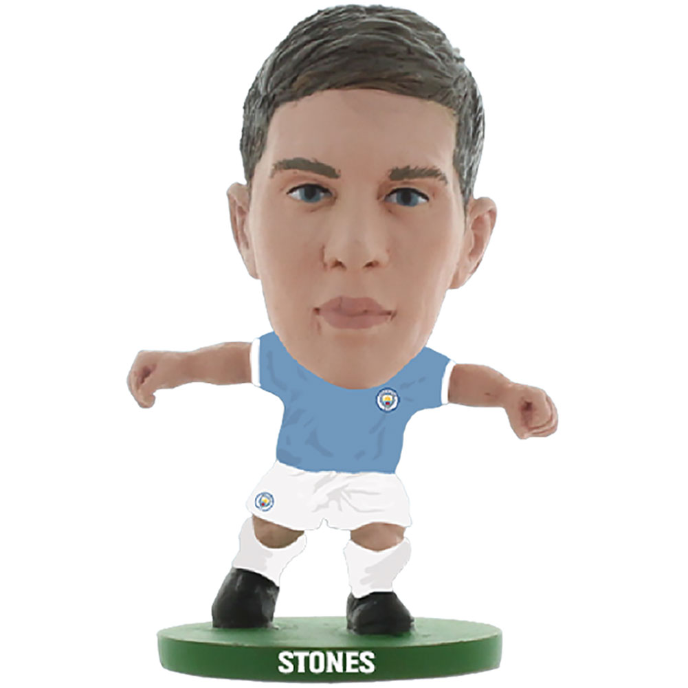 Manchester City SoccerStarz John Stones collectable figure in the classic City home kit on a green base