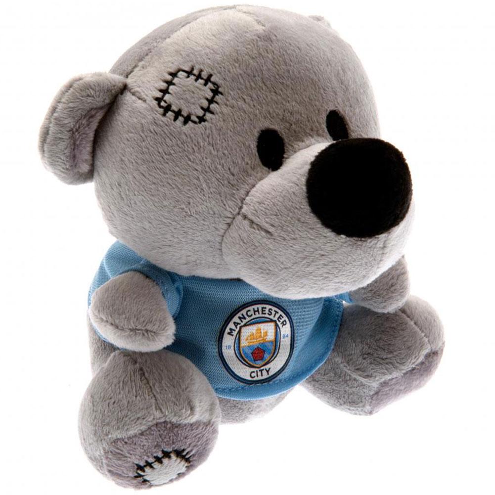 Grey Manchester City FC Timmy Bear plush in a sky blue t-shirt with a full colour club crest
