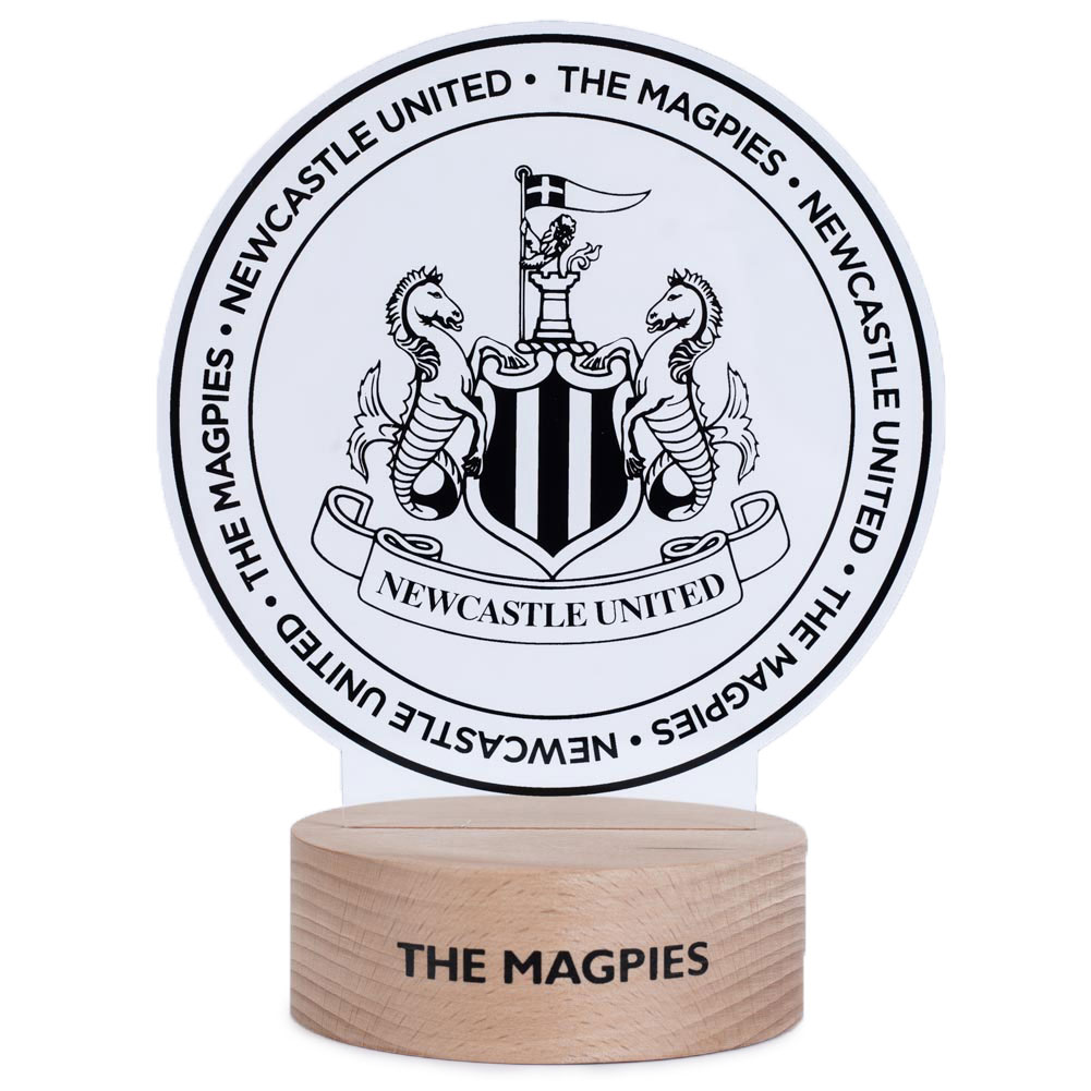 Newcastle United FC LED desk light with a wooden base and a clear plastic insert showing the club crest