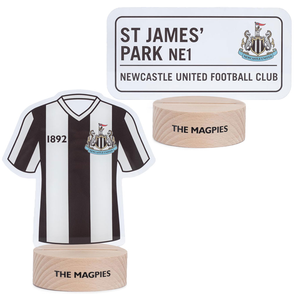 Newcastle United FC LED desk light with a wooden base and clear plastic slide inserts of a shirt and a street sign