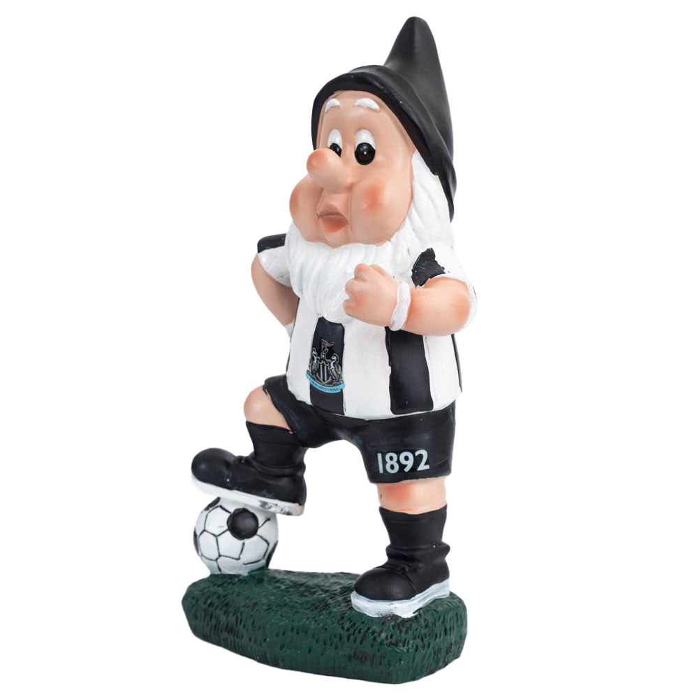 Newcastle United FC resin garden gnome in classic home kit colours with a foot on the ball
