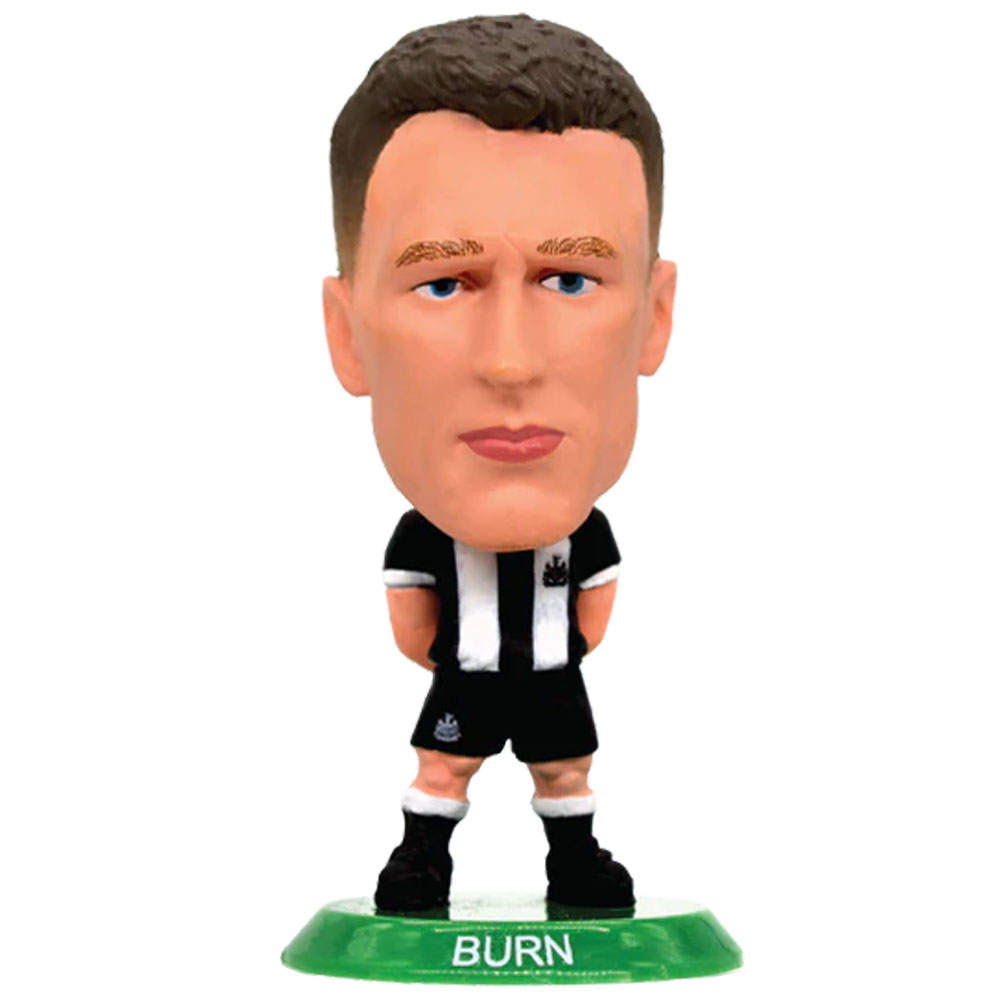 Dan Burn SoccerStarz figure in the classic Newcastle home kit on a green base