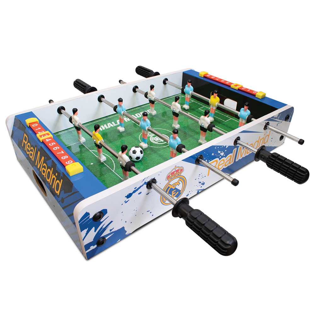 Real Madrid CF table top football game with a grass effect pitch, stadium graphics and white and blue players